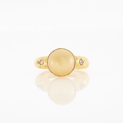 Lot 2151 - High Karat Hammered Gold, Golden Cultured Pearl and Diamond Ring