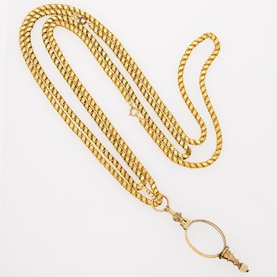 Lot 2111 - Gold Lorgnette with Two Long Gold Chain Necklaces
