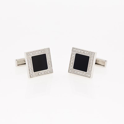 Lot 1105 - Bulgari Pair of White Gold, Black Onyx and Diamond Cufflinks