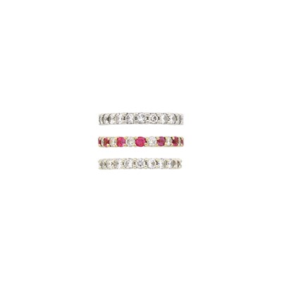 Lot 127 - Two Platinum, Diamond Band Rings and White Gold, Pink Sapphire and Diamond Band Ring
