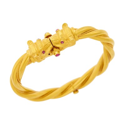 Lot 24 - High Karat Braided Gold and Cabochon Ruby Chimera Bangle Bracelet