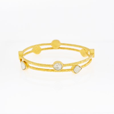 Lot 1203 - Pair of High Karat Gold and Diamond Bangle Bracelets