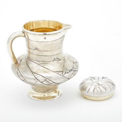 Lot 28 - Russian Parcel-Gilt Silver Trompe l’oeil Jug
