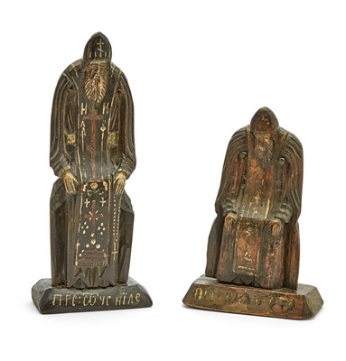 Lot 620 - Two Russian Carved and Painted Wood Figures of St. Nilus Stolobensky