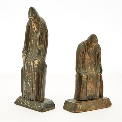 Lot 99 - Two Russian Carved and Painted Wood Figures of St. Nilus Stolobensky