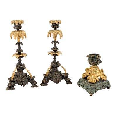 Lot 409 - Three Patinated and Gilt-Bronze Candlesticks