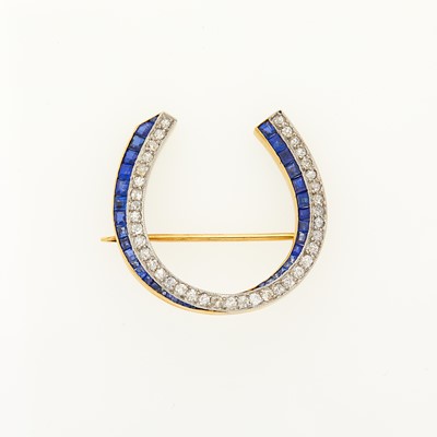 Lot 1157 - Gold, Platinum, Diamond and Sapphire Horseshoe Pin