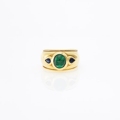 Lot 1009 - Sabbadini Gold, Cabochon Sapphire and Emerald Ring