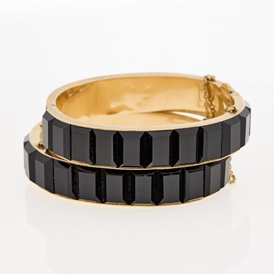Lot 1162 - Pair of Antique Gold and Black Onyx and Enamel Bangle Bracelets