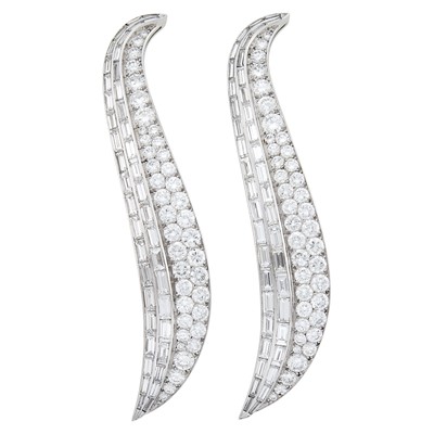 Lot 242 - Pair of Platinum and Diamond Flared Ribbon Brooches, France