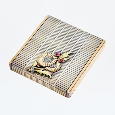 Lot 1097 - Mauboussin Silver, Two-Color Gold, Cabochon Ruby and Diamond Compact