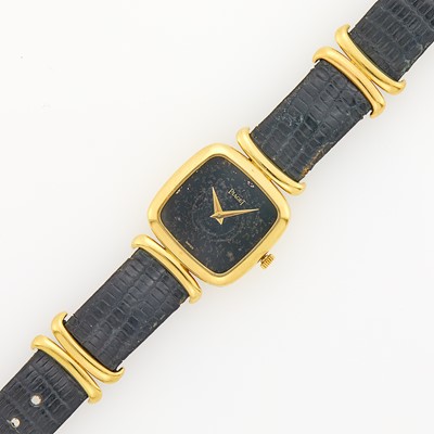 Lot 1013 - Piaget Gold and Black Hardstone Wristwatch