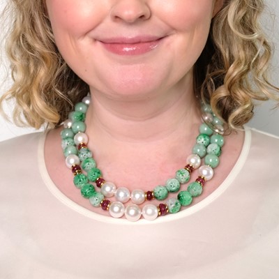 Lot 73 - Seaman Schepps Long Gold, Carved Jade, Jade and Ruby Bead and South Sea Cultured Pearl Necklace/Pair of Necklaces