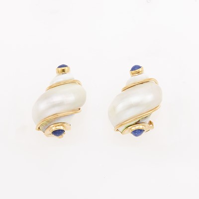 Lot 1029 - Seaman Schepps Pair of Shell, Gold and Cabochon Sapphire 'Turbo Shell' Earrings