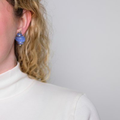 Lot 21 - Seaman Schepps Pair of Gold, Carved Rock Crystal, Blue Chalcedony and Blue Topaz Shell Earclips