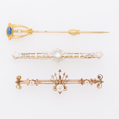 Lot 1123 - Three Gold, Low Karat Gold, Diamond and Simulated Diamond Pins