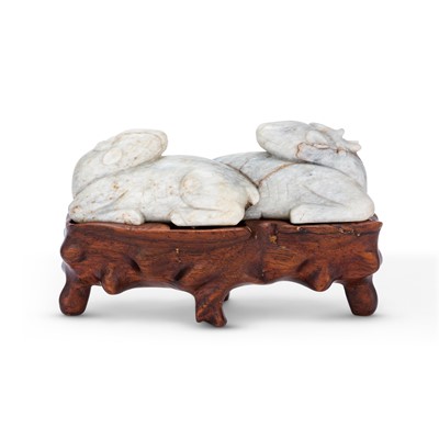 Lot 22 - A Chinese Mottled Jade Carving