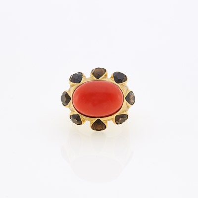 Lot 1192 - Gold, Cabochon Coral and Smoky Quartz Ring
