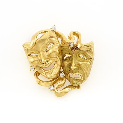 Lot 1056 - Gold and Diamond 'Comedy and Tragedy' Pendant