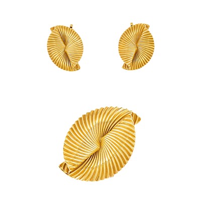 Lot 2146 - Tiffany & Co., George Schuler Gold Retro Clip-Brooch and Pair of Earclips