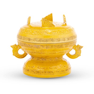 Lot 721 - A Chinese Carved and Yellow Glazed Porcelain Gui Vessel