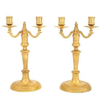 Lot 219 - Pair of Régence Style  Gilt Bronze Two-Light Candelabra