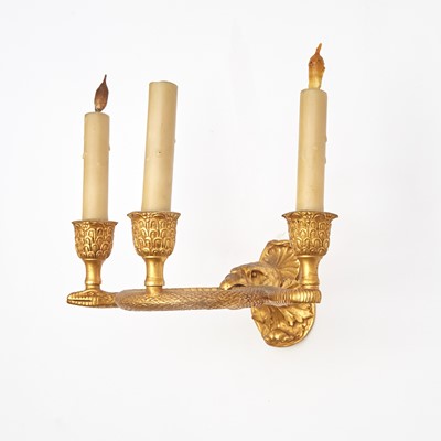 Lot 280 - Set of Four Louis XVI Style Gilt Bronze Three-Light Wall Lights