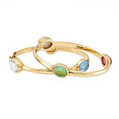 Lot 2012 - Christopher Walling Two Gold and Gem-Set Bangle Bracelets