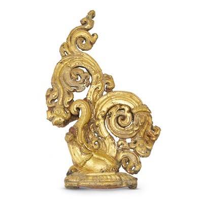 Lot 754 - A Tibetan Gilt Copper Repousse Makara Plaque