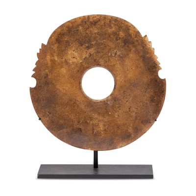 Lot 429 - A Chinese Russet Jade Bi Disc