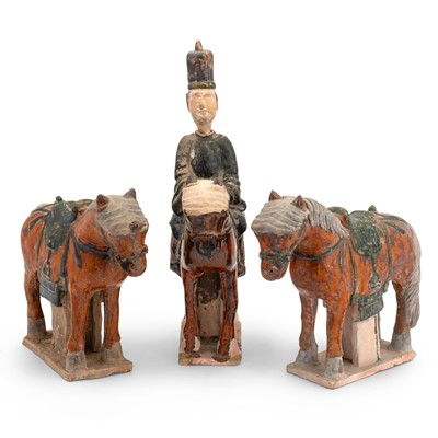 Lot 108 - A Chinese Glazed Pottery Equestrian with a Pair of Horses