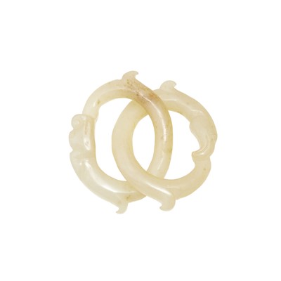 Lot 469 - A Pair of Han-style Chinese Interlocking Jade Rings
