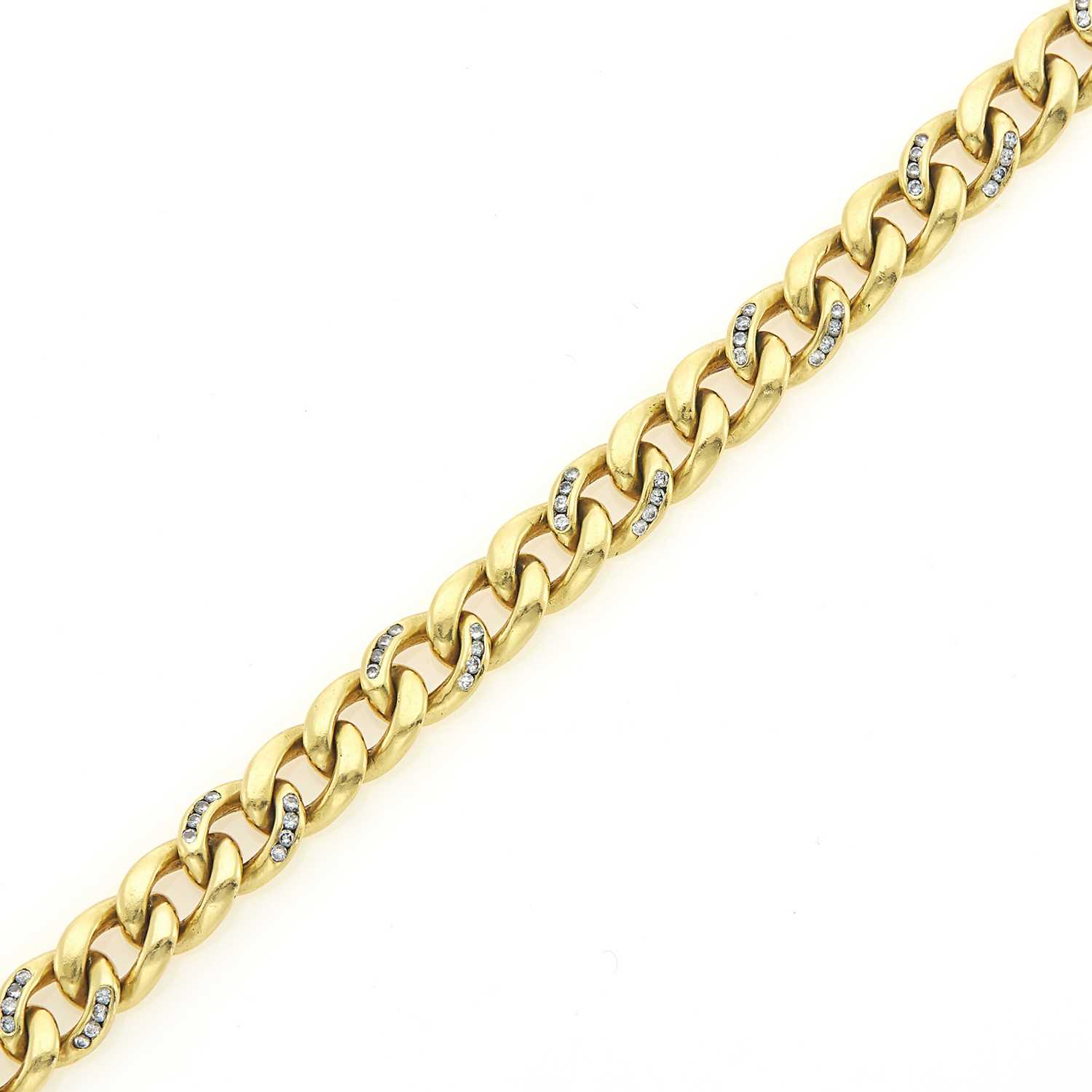 Lot 1004 - Gold and Diamond Curb Link Bracelet