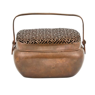 Lot 544 - A Chinese Bronze Handwarmer