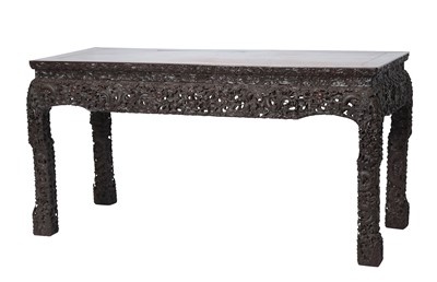 Lot 556 - A Chinese Carved Hardwood Table