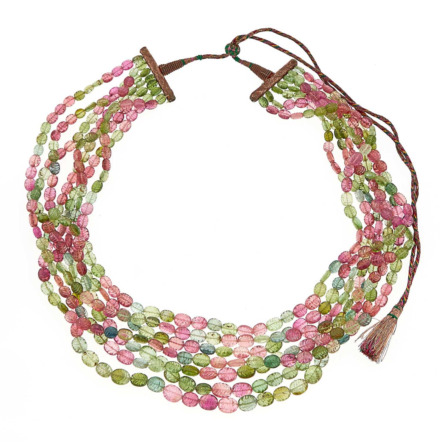Lot 1125 - Multistrand Carved Tourmaline Bead Necklace with Cord