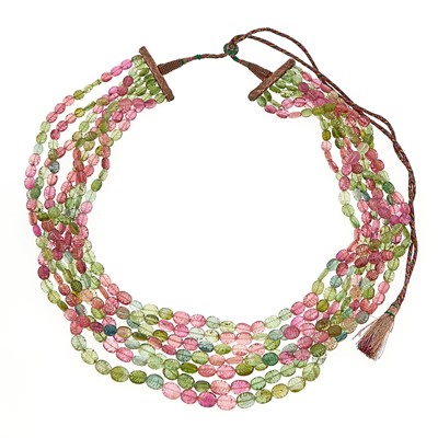 Lot 1125 - Multistrand Carved Tourmaline Bead Necklace with Cord