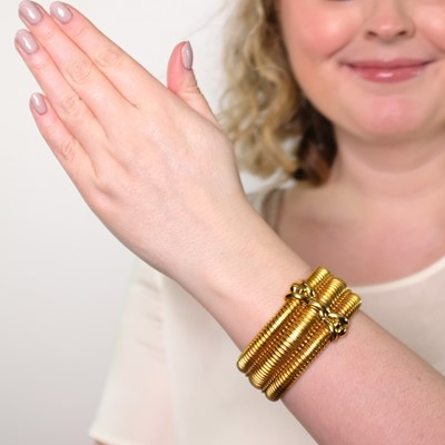 Lot 81 - Antique Wide Triple Strand Gold Snake Link Bracelet