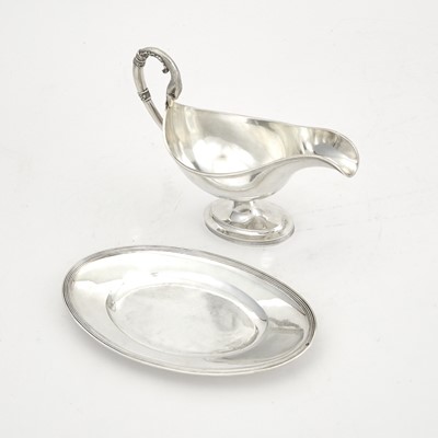 Lot 110 - French Empire Sterling Silver Sauceboat and Stand