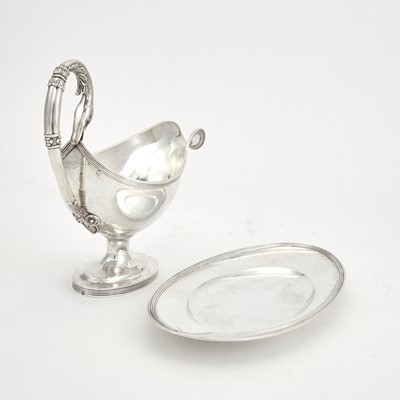 Lot 110 - French Empire Sterling Silver Sauceboat and Stand