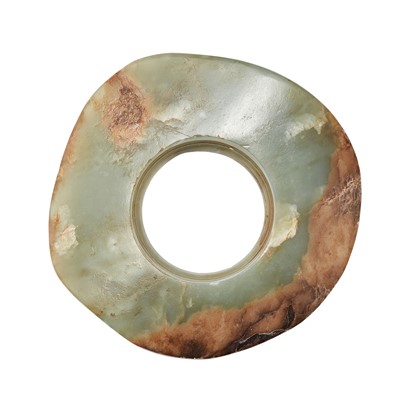 Lot 422 - A Chinese Archaistic Celadon Jade Bi
