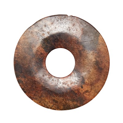 Lot 420 - A Chinese Mottled Archaistic Jade Bi