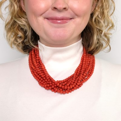 Lot 26 - Multistrand Coral Bead Torsade Necklace with Two-Color Gold Clasp