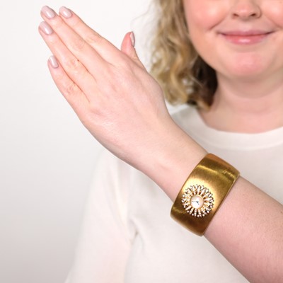 Lot 26 - Buccellati Gold, Mother-of-Pearl and Diamond 'Anthochron Dahlia' Cuff Bracelet-Watch, Ref. W0800270