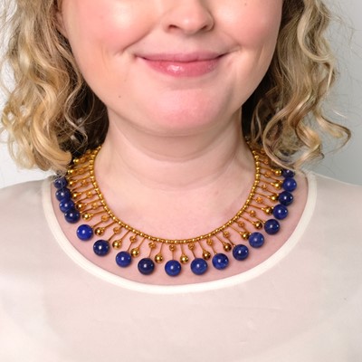 Lot 82 - Archaeological Revival Gold and Lapis Bead Fringe Necklace