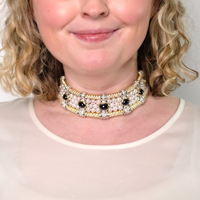 Lot 38 - Bulgari Wide Two-Color Gold, Cultured Pearl, Cabochon Sapphire and Diamond Choker Necklace