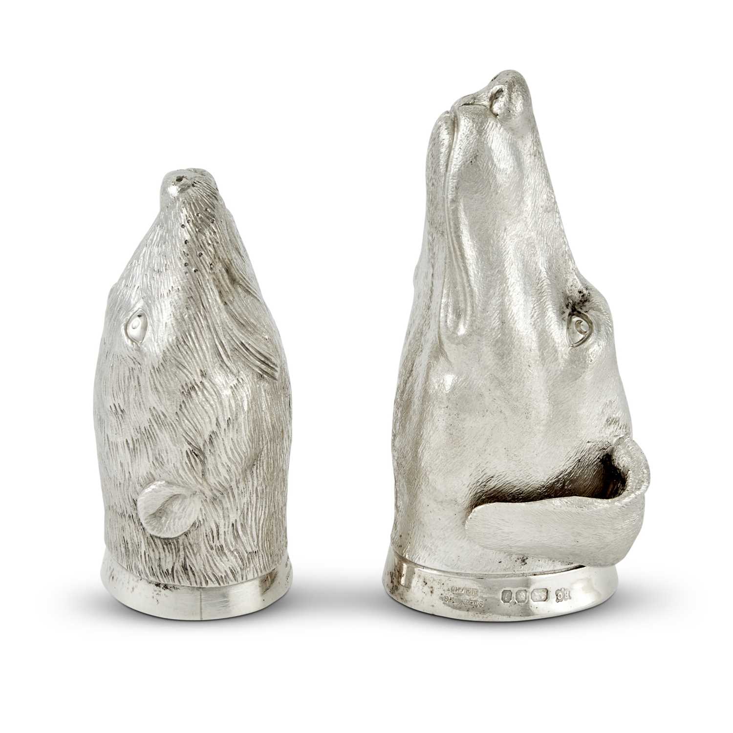 Lot 522 - Pair of English Sterling Silver Fox and Otter Stirrup Cups