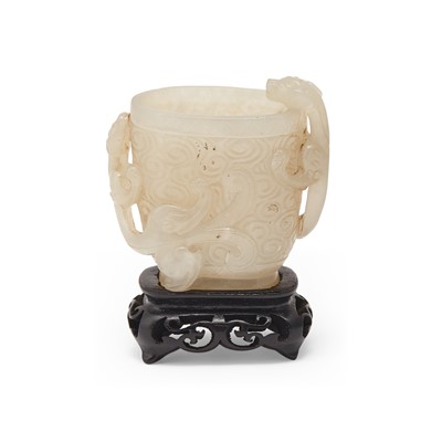 Lot 446 - A Chinese White Jade Cup and Stand
