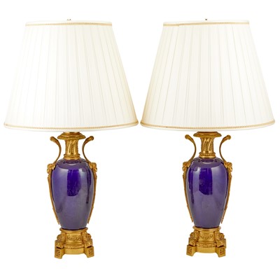 Lot 323 - Pair of Louis XVI Style Gilt Bronze Mounted Cobalt Blue Porcelain Lamps