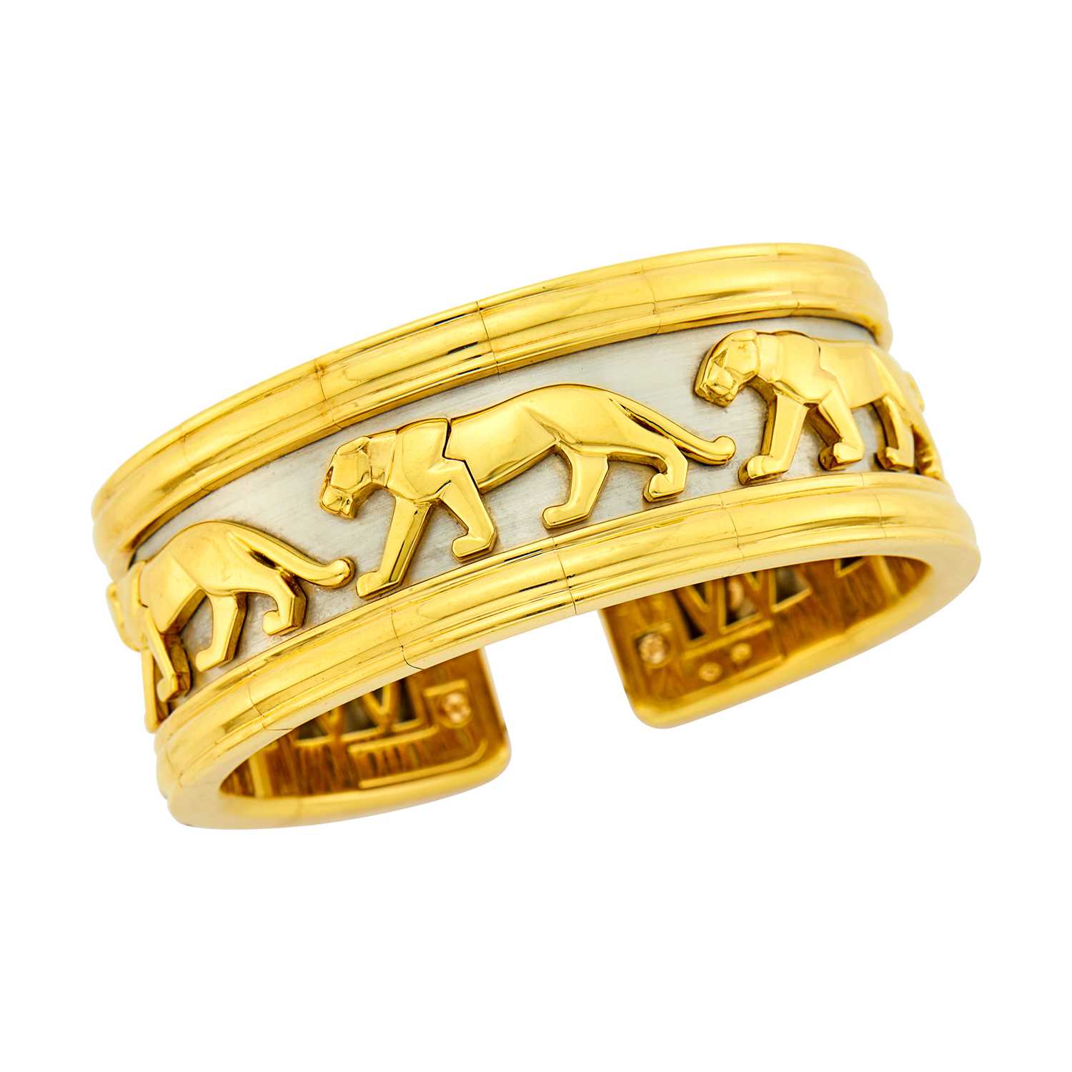 Lot 54 - Cartier Two-Color Gold 'Pharaon' Panther Cuff Bangle Bracelet, France